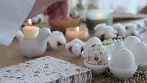 Easter eggs with a pattern in hands, female hands decorate eggs for Easter Video stock 238020685