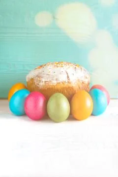 Easter Eggs with Pie on a Bright Blue Background. Easter. Copy Space Stock Photos