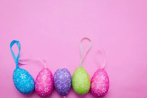 Easter eggs on a pink background Stock Photos