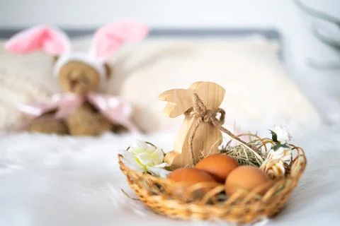 Easter eggs placed in a decorative nest, symbolizing spring celebration 스톡 사진