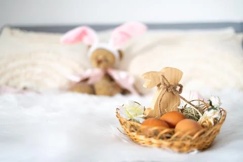 Easter eggs placed in a decorative nest, symbolizing spring celebration Foto stock