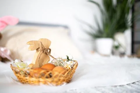 Easter eggs placed in a decorative nest, symbolizing spring celebration 스톡 사진