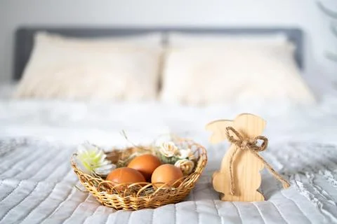 Easter eggs placed in a decorative nest, symbolizing spring celebration 库存照片