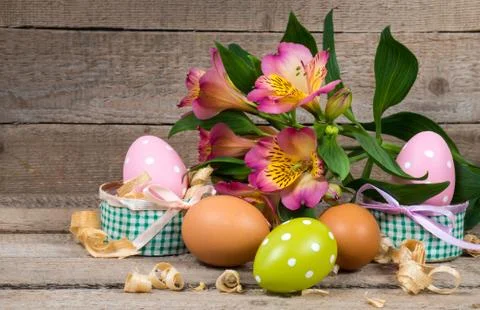 Easter eggs in a pot and flower Stock Photos
