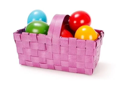 Easter eggs in purple basket Stock Photos