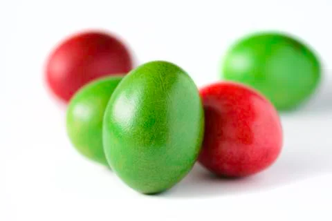 Easter eggs red and green isolated on white background. Stock Photos