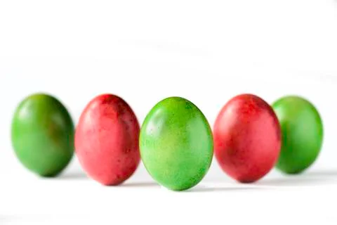 Easter eggs red and green isolated on white background. Stock Photos