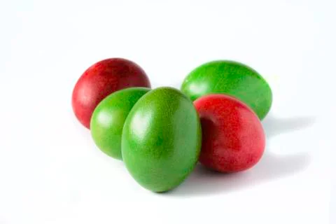 Easter eggs red and green isolated on white background. Stock Photos