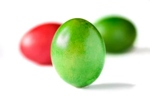 Easter eggs red and green isolated on white background. Stock Photos