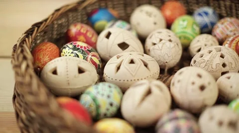 Easter eggs rolling on green background Stock Footage 61562457