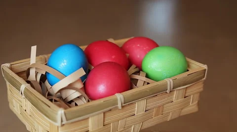 Easter eggs in rotate basket Stock Footage 49079308