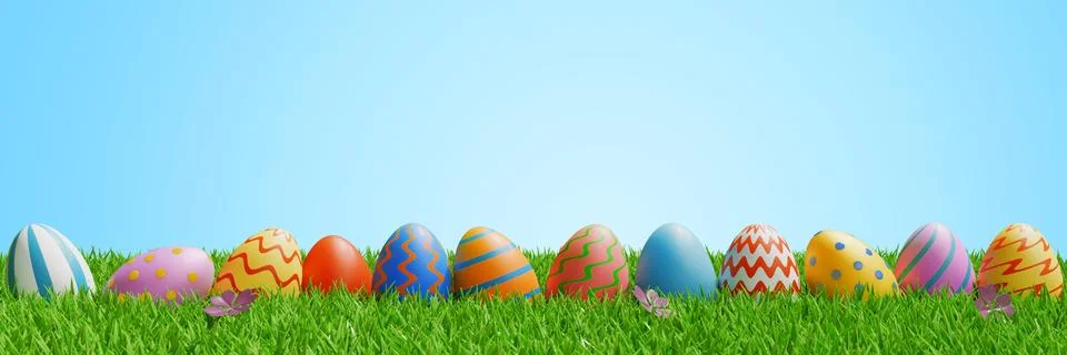 Easter eggs in a row on a meadow in the grass Illustrazione stock