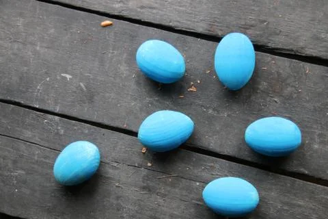 Easter eggs on rustic table Stock Photos