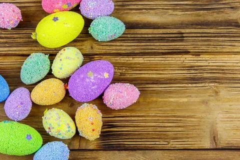 Easter eggs on rustic wooden background. Top view, copy space 写真素材