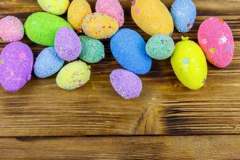 Easter eggs on rustic wooden background. Top view, copy space Stock Photos