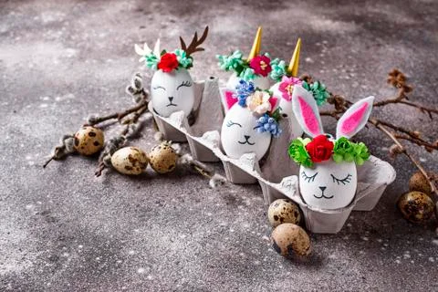Easter eggs in shape of bunny, cat and deer Stock Photos