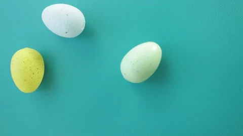 Easter eggs spin on a green background Stock Footage 232923555
