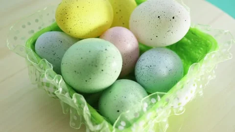 Easter eggs spinning in a basket, close-ups, spring holiday Stock Footage 236772815