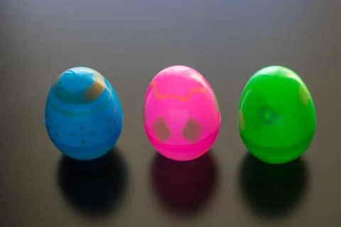 Easter Eggs stand up in front of a black background Stock Photos