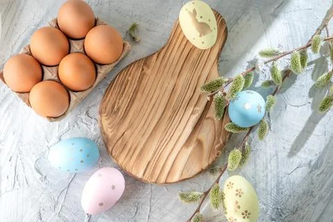 Easter eggs on the table and willow, holiday symbol, cultural traditions Stock Photos