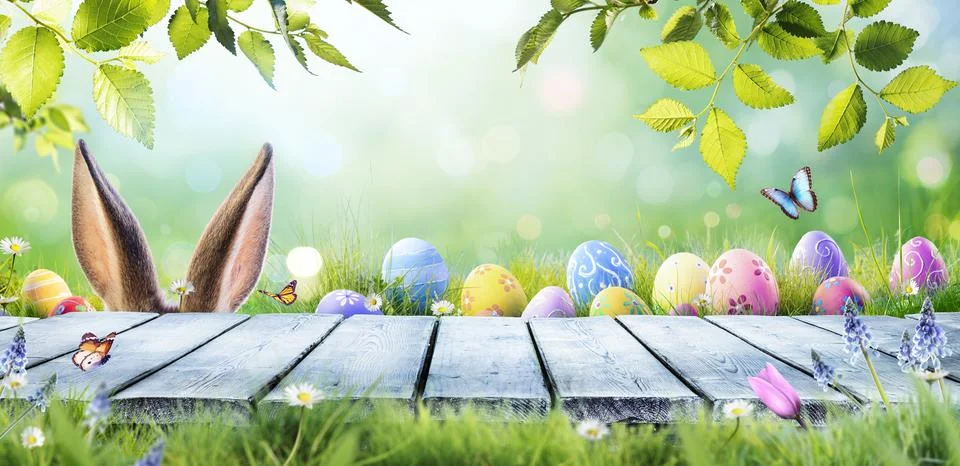 Easter Eggs On Table In Spring Green Garden - Ears Bunny Hidden Stock Photos