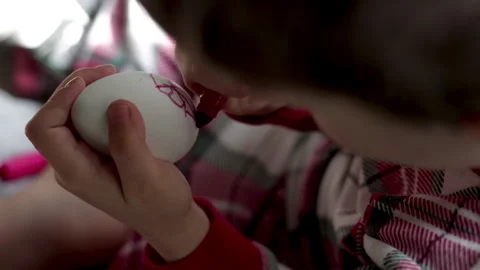 Easter eggs toddler decorating eggs with marker. Stock Footage 332082336