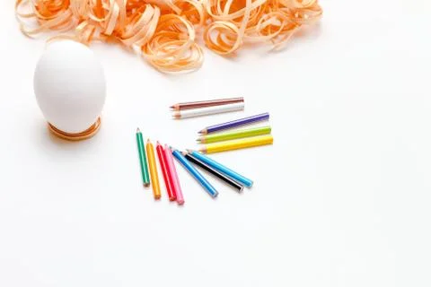 Easter eggs with twelve crayons Stock Photos
