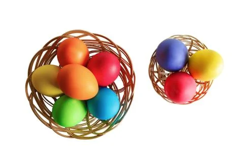 Easter eggs in two wicker baskets Stock Photos
