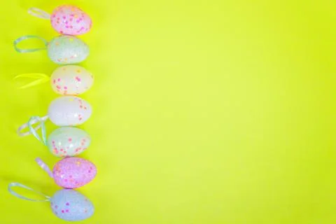 Easter eggs in vignetted frame Stock Photos