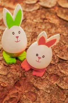 Easter eggs on a walk on a tree bark Stock Photos