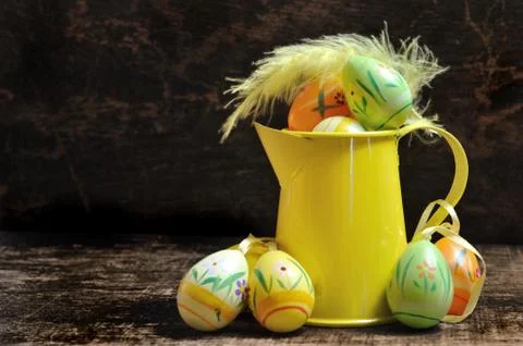 Easter eggs with watering can Foto stock