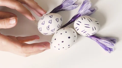 Easter eggs on a white background with flowers. Easter decor. white eggs with 스톡 동영상 108196980