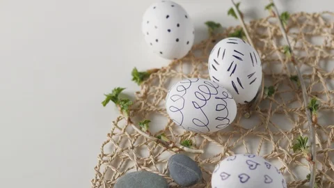 Easter eggs on a white background with flowers. Easter decor. white eggs with Stock-Footage 108324916