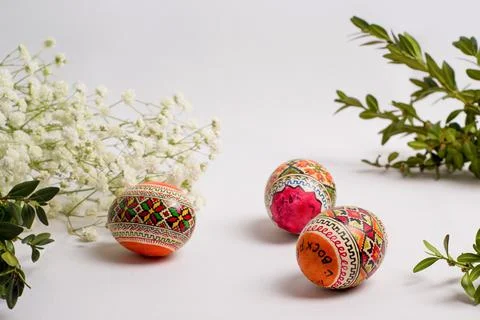 Easter eggs on a white background, greeting card for the holiday Stock Photos