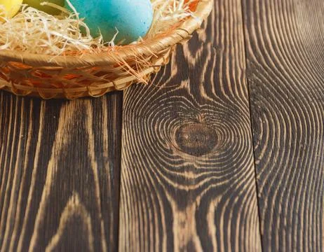 Easter eggs on wooden background with copyspace Stock Photos