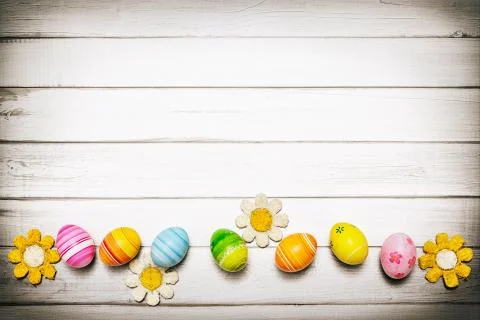 Easter eggs on wooden background Stock Photos