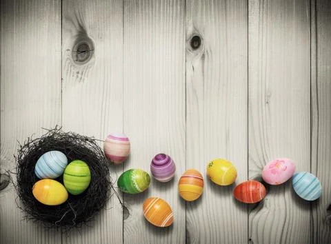 Easter eggs on wooden background Stock Photos