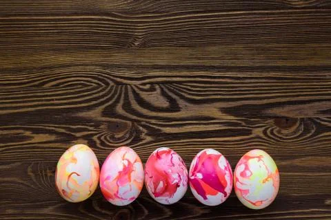 Easter eggs on wooden background Stock Photos