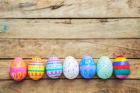 Easter eggs on wooden background with space Stock Photos