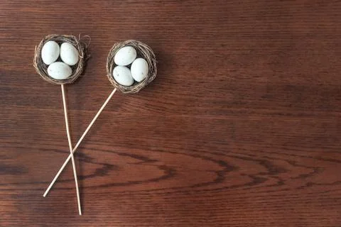 Easter eggs on wooden board, easter holiday concept. Copyspace for text. Stock Photos