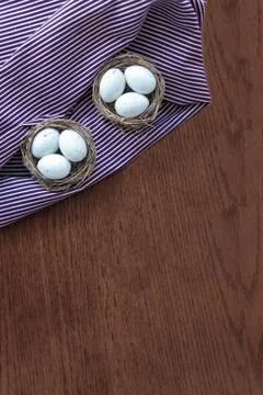 Easter eggs on wooden board, easter holiday concept. Copyspace for text. Stock Photos