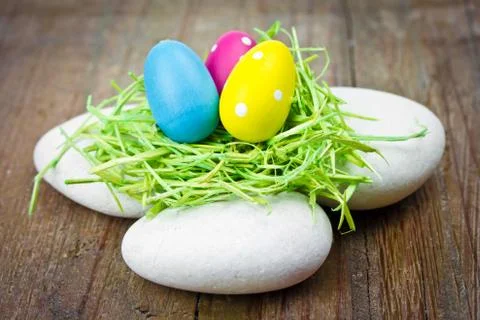 Easter eggs on wooden table Stock Photos
