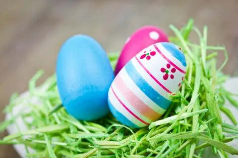 Easter eggs on wooden table Stock Photos