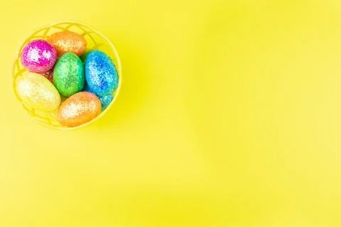 Easter eggs on yellow background Stock Photos