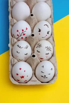 Easter eggs on yellow blue background Stock Photos