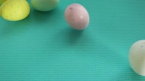 Easter eggs yellow pink green closeup happy easter Stock Footage 172470752