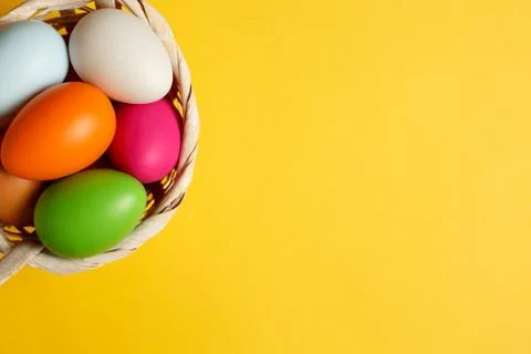 Easter eggs on a yellow table Stock Photos