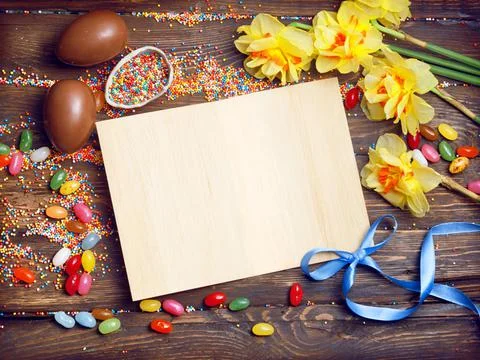 Easter empty background with Easter eggs and spring flowers Stock Photos