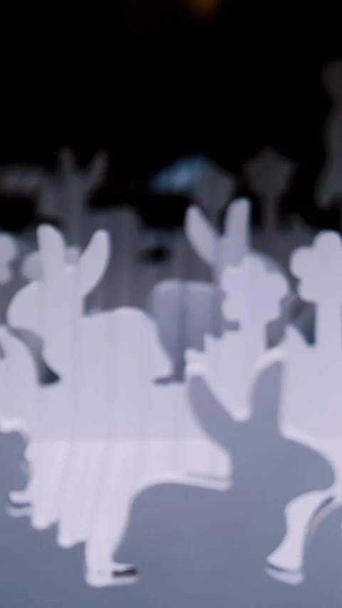 Easter fair. close-up. decorative white figurines of Easter bunnies in the grass Stock Footage 315444326