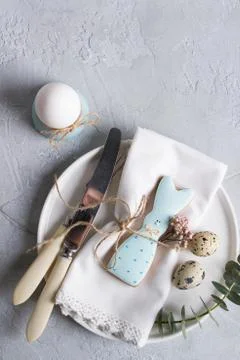Easter  festive table setting with Easter bunny cookies, quail eggs Stock Photos